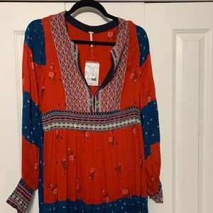 Free People dress, new with tags. Size medium.